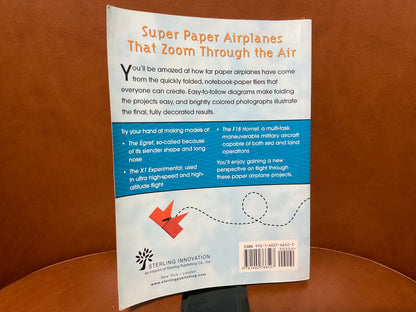 Zooming Paper Airplanes by Norman Schmidt